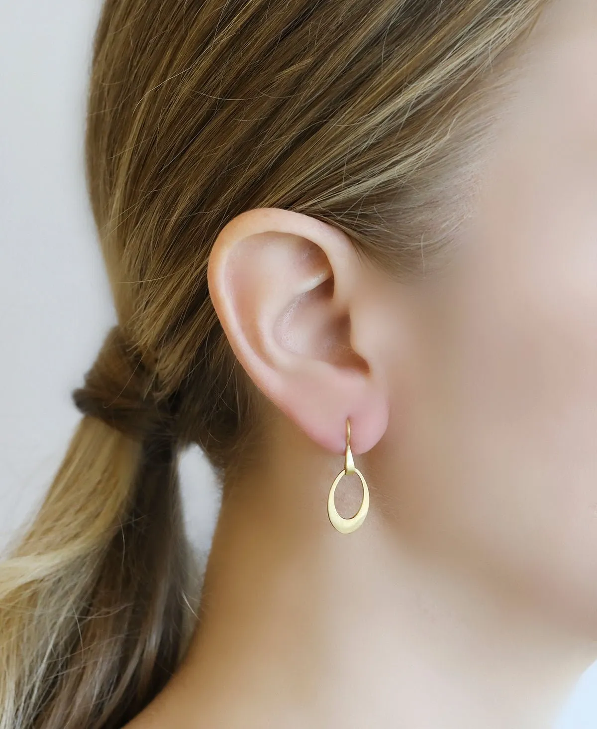 20K Gold Mini Pear-Shaped Doorknocker Earrings on Sculptural Ear Wires